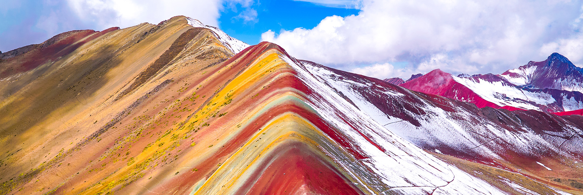 breath taking view of rainbow mountain covered in snow